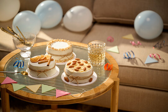 Delicious mini cakes with decorations on a table for a celebration