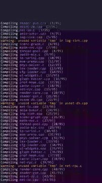 Vertical terminal screen recording: compiler build output with progress percentages and warnings on display, ending at succeeded. Developer aesthetic for programming and software themes.
