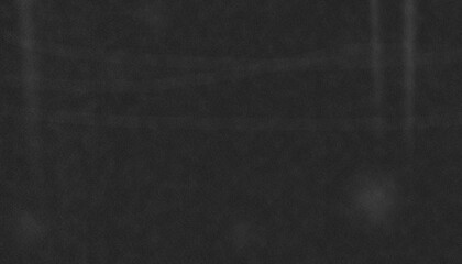 Fototapeta premium Dark Grainy Film Texture with Subtle Vintage Noise Background