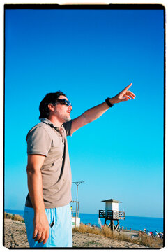 Man Pointing at Sky