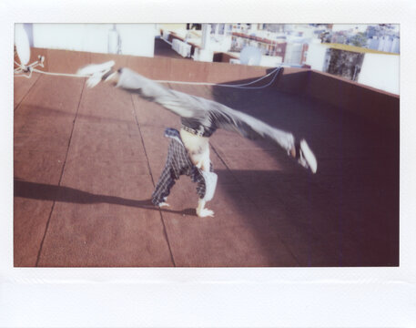 Rooftop Handstand polaroid