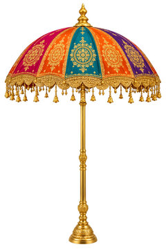 Decorative oriental garden umbrella with colorful silk fabric and golden tassels serves as luxury outdoor sunshade for weddings or festive traditional events.