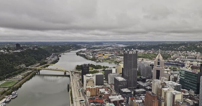 Pittsburgh Pennsylvania Aerial v121 flyover downtown capturing the confluence of Allegheny and Monongahela Rivers, and urban cityscape under a cloudy sky - Shot with 5k Camera - Sept 25th 2023