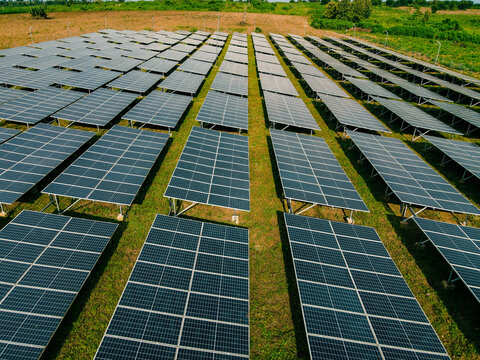 Aerial view of rows of solar panels installed in a field in Ogun State, Nigeria.