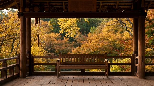 a traditional Japanesestyle wooden structure, likely a shrine or pavilion, set against a backdrop of autumnal foliage. The structure features a wooden bench positioned on a wooden deck.