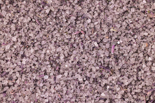 Lavender bath salt crystals creating textured background