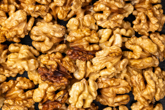 Walnut kernels providing healthy organic food ingredient background