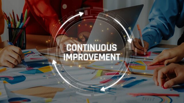 Collaborative Workspace Focused on Continuous Improvement with Colorful Graphs and Engaged Teamwork in a Modern Office Environment Sigmoid