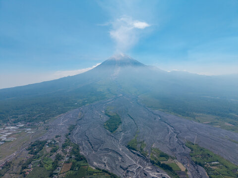 Aerial view of Mount Semeru with volcanic ash deposits covering the landscape near Supiturang Village in Pronojiwo, East Java, Indonesia.