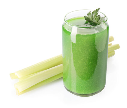 Fresh celery juice in glass and ingredients isolated on white