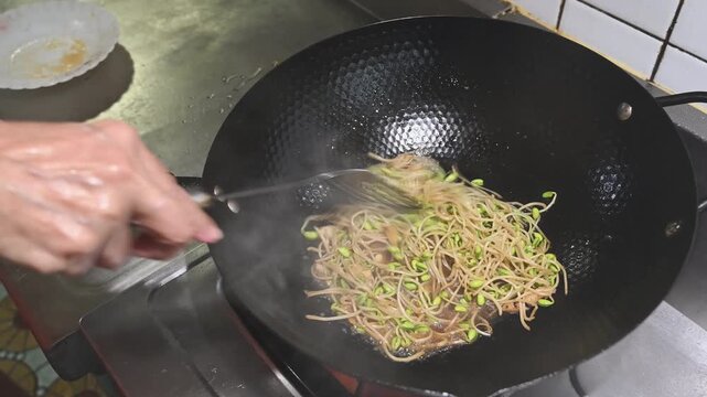 Stir Frying Soybean Sprouts in a Hot Iron Wok with Wok Hei