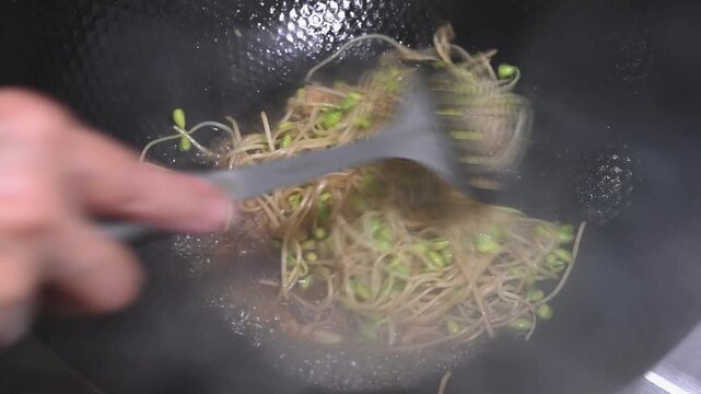 Stir Frying Soybean Sprouts in a Hot Iron Wok with Wok Hei