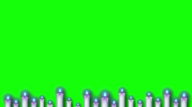 Row of Burning Halloween Candles on Green Screen Background