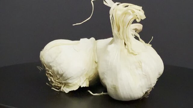 Close-up shot of three heads of garlic. Natural, healthy food.