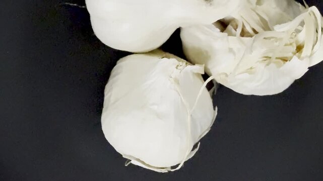 Close-up shot of three heads of garlic. Natural, healthy food.