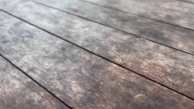 Perspective view of weathered wooden plank tiles flooring