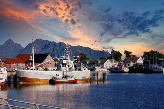 Evening atmosphere with fishing boats in Svolvaer harbor on the Lofoten Islands