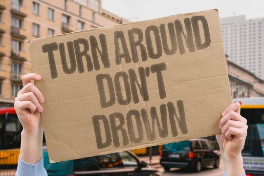 "Turn around don't drown" Flooded roads trap drivers. ROAD. CAR. WATER. DRIVE. DEATH.