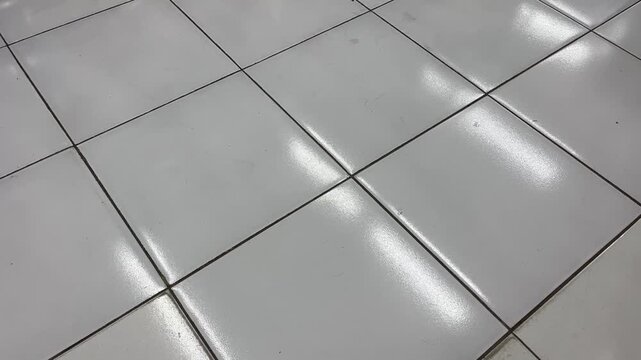 High Angle Diagonal View of Shiny White Ceramic Floor Tiles