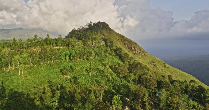 Ella Sri Lanka Aerial v8 drone flyover Litte Adam's Peak capturing flying ravana zip-line and beautiful lush nature landscape of hills and valleys at sunset - Shot with Mavic 3 Cine - April 2023