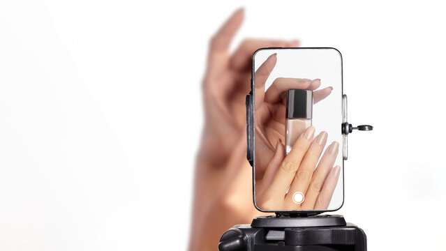 Nail Care Snapshot. Closeup Of Nails With Reflection And Professional Lighting. Focused Shot Of Wellmaintained Nails Reflected In Mirror With Controlled Lighting And Minimal Background