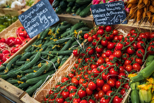 Fresh cherry tomatoes on the vine at a provencal farmers market, Antibes, France