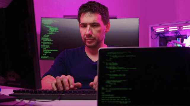 Solo software engineer working through technical issues late at night. Dedicated coder in dim lighting diagnosing problems on open computer case with intense concentration