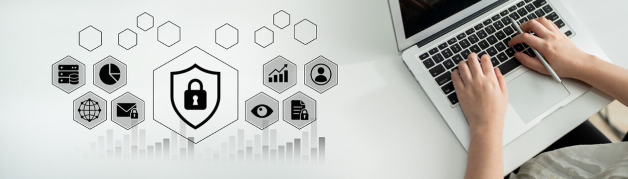 A person works on a laptop surrounded by icons illustrating data protection and cybersecurity concepts, highlighting the importance of online security in today digital landscape. Nascent