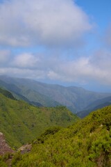Fototapeta premium Sunlit green ridges in the Madeira mountains