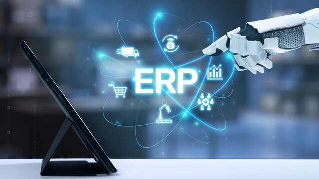 A robotic hand interacts with a tablet displaying a digital ERP concept, showcasing the intersection of technology, automation, and business management in a modern office setting. Salient