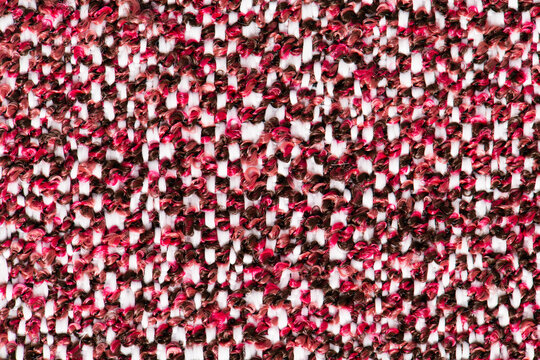 Multi colored woven tweed textile texture background surface