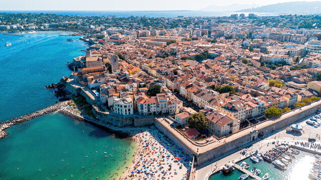 Aerial drone view of the old town, ramparts, and coastline of Antibes on the French Riviera