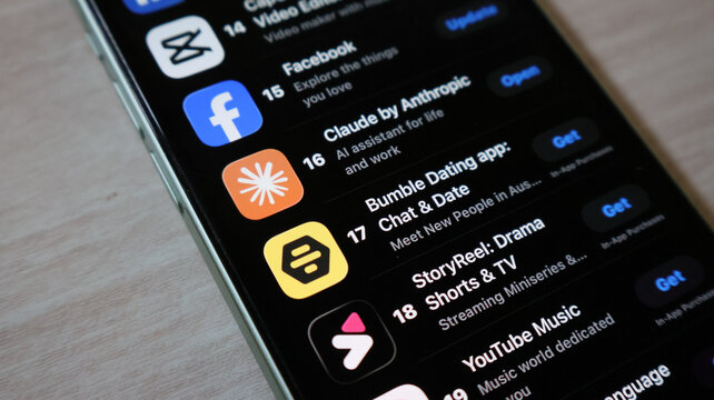 Smartphone screen featuring trending mobile applications list and download interface.