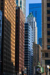 Obraz premium Chicago architecture blending historic Mather Tower with modern skyscrapers