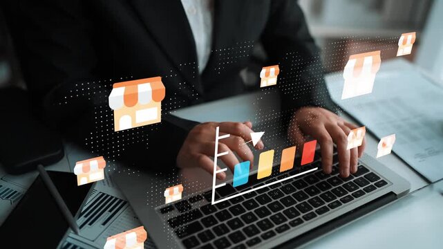 Business professional analyzing market trends with digital graphs and shop icons on laptop, representing e-commerce growth and strategic planning Gluon.