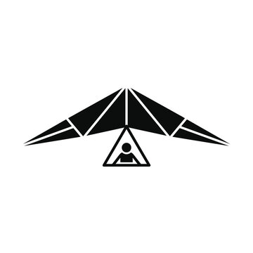 Isolated silhouette of a hang glider with pilot