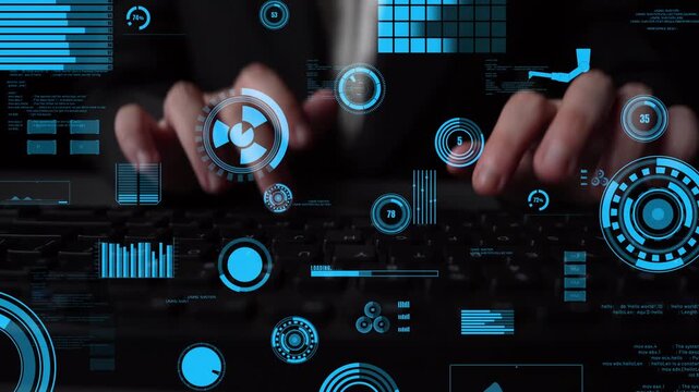Person typing on a keyboard with futuristic digital interface overlay featuring graphs and data visualizations, illustrating the intersection of technology and human interaction. Xenic