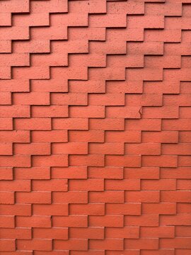 Red clay brick tile wall background texture in minimalist style, rustic masonry surface pattern for architecture and interior design