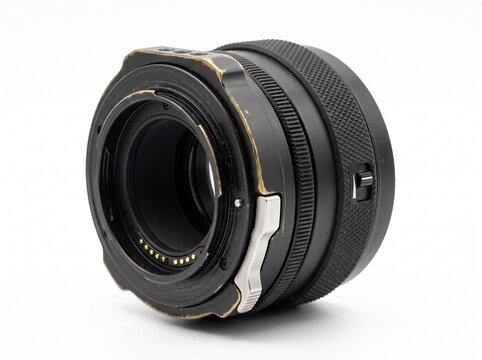 Close-up of a camera lens with black and silver ring details