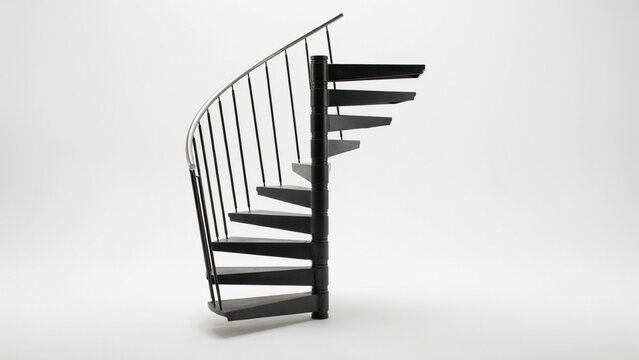 Black spiral staircase with metal railing against white background, stairs interior d