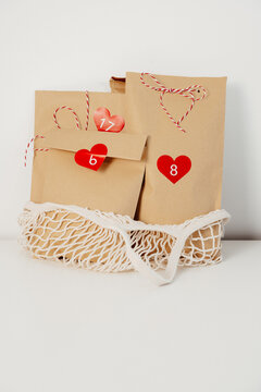 advent calendar recycled craft bags in string bag. eco-friendly christmas