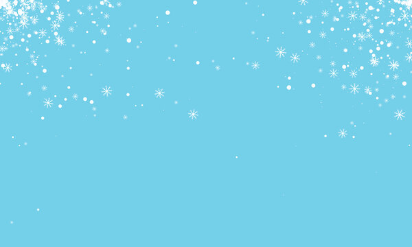 Falling snowflakes on a bright cyan background with copy space for winter season themes