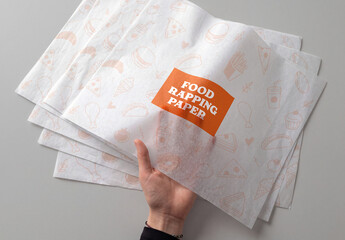 Food Wrapping Paper Mockup with Handheld Packaging Design
