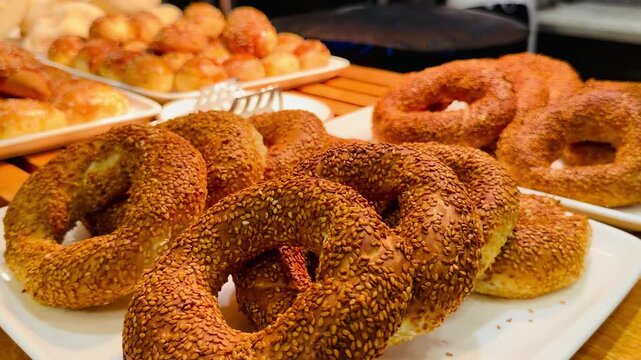 Traditional turkish simit sesame bagels on luxury five stars Sharm El Sheikh resort all inclusive buffet in Egypt. Premium bakery catering on Sinai Peninsula hotel counter. Morning breakfast video.
