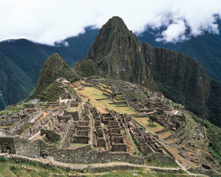 Panoramic view of the Inca citadel of Machu Picchu with Huayna Picchu peak in Peru