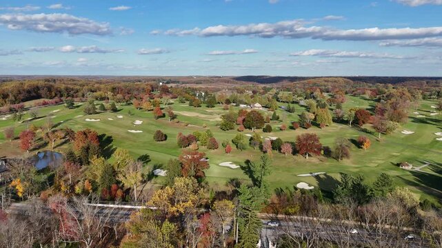 Aerial View of a Golf Course in Autumn with Colorful Fall Foliage in Greenville, Delaware