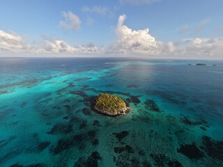 Aerial View of Crab Cay Cayo Cangrejo Surrounded by Turquoise Waters and Coral Barrier Reef in Providencia Island, Colombia Caribbean Sea Travel Destination Microstock Photography Background © franciscojrg