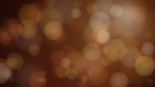 Soft Focus Bokeh Lights Abstract Background with Hexagonal Shapes and Warm Tones.