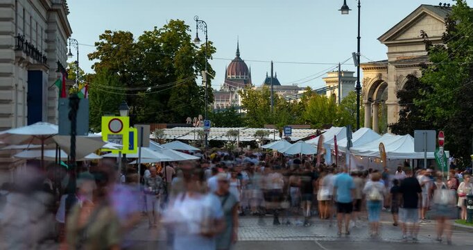 Budapest Hungary timelapse overlooking Hungarian Parliament dome across Miklos ter during Saint Stephen Day festival celebration