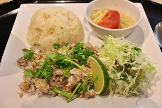 Lao cuisine: larb moo (minced pork salad) with khao niao (sticky rice)